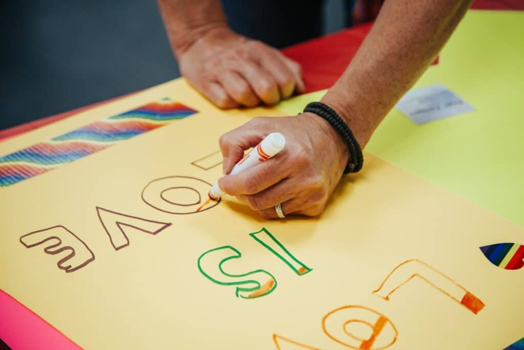 Kamloops LGBTQ2S+ students prepare signs for the 2017 Kamloops Pride Parade
