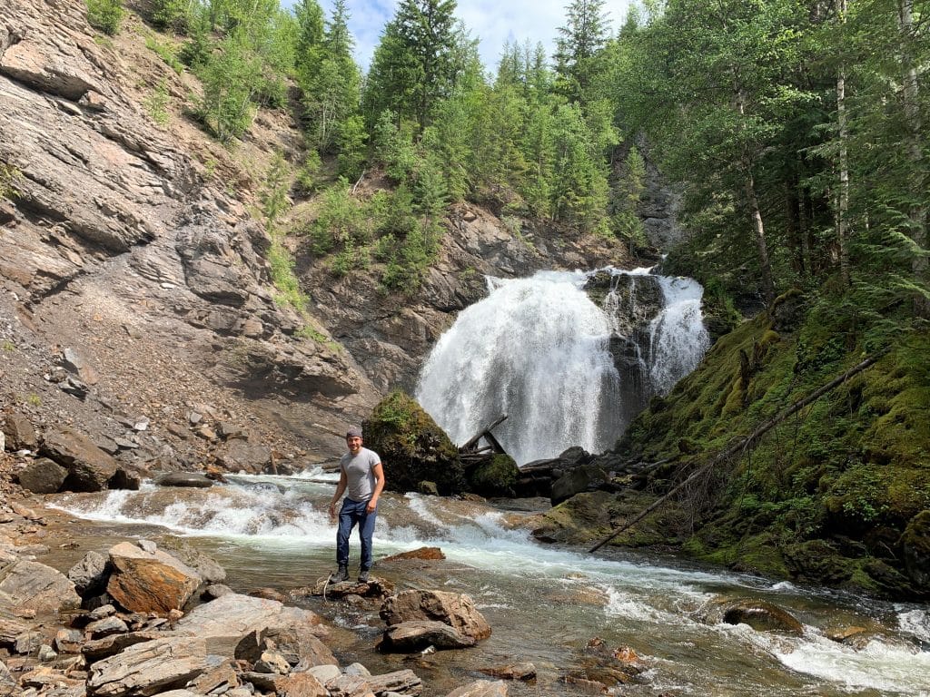 TRU international student Ilkay Çakiroǧullari stands in front of a waterfall at McDiarmidFalls/Wells Gray Provincial Park. Submitted photo.  