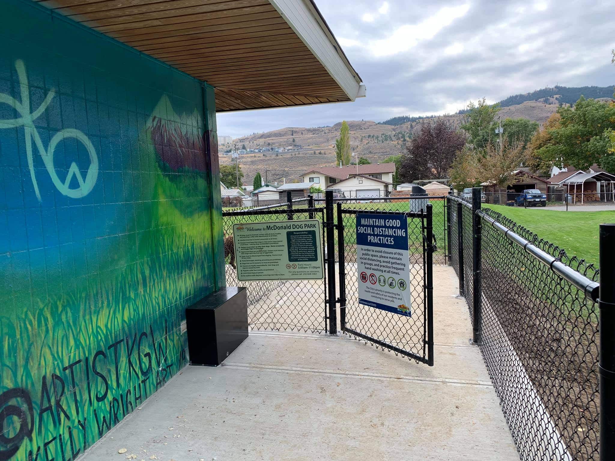 The MacDonald Park in Kamloops is shown from the side of the building, where a wide grate opens up to the dog park.