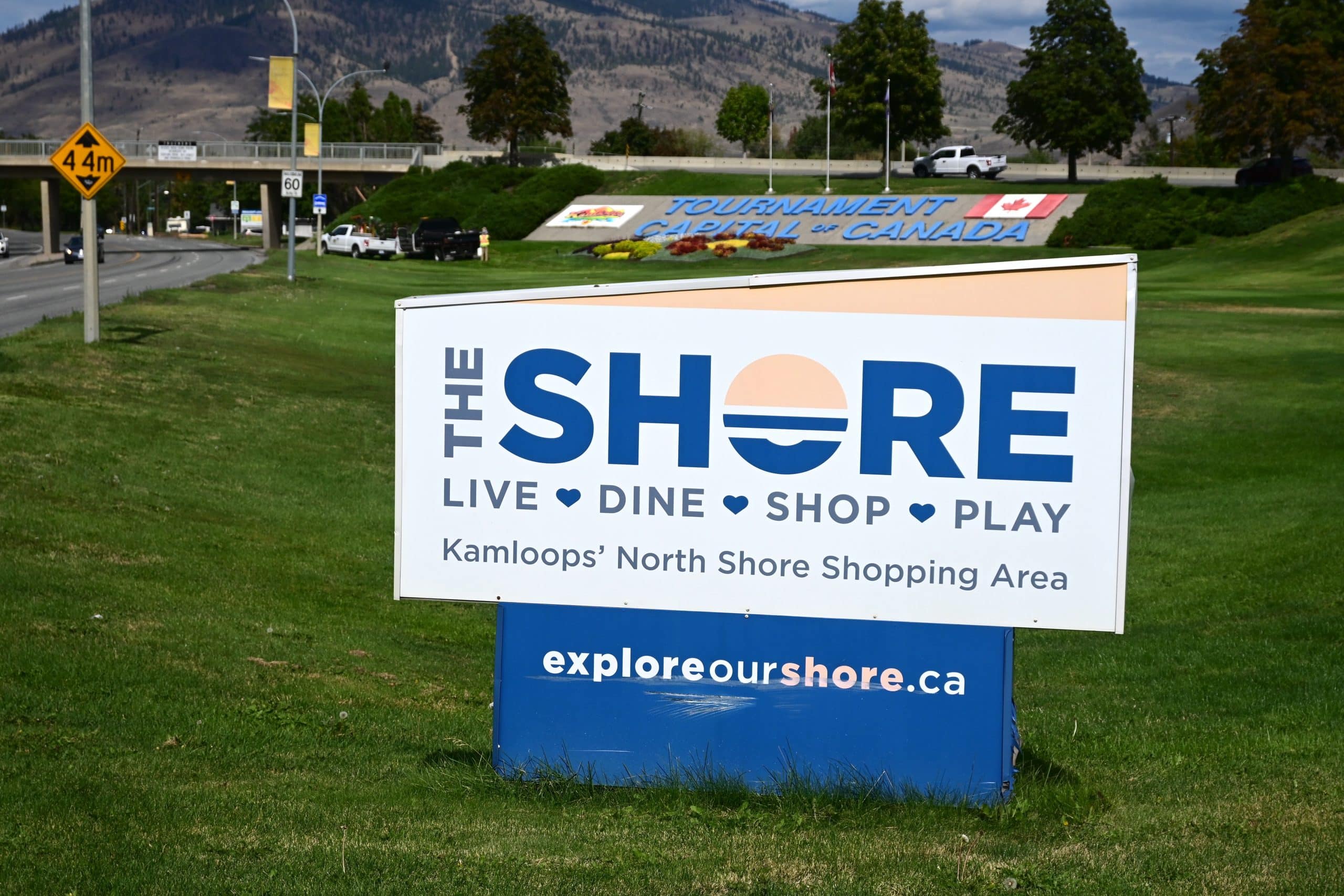 The North Shore is celebrated as a place to "live, dine, shop, play" on a welcome sign