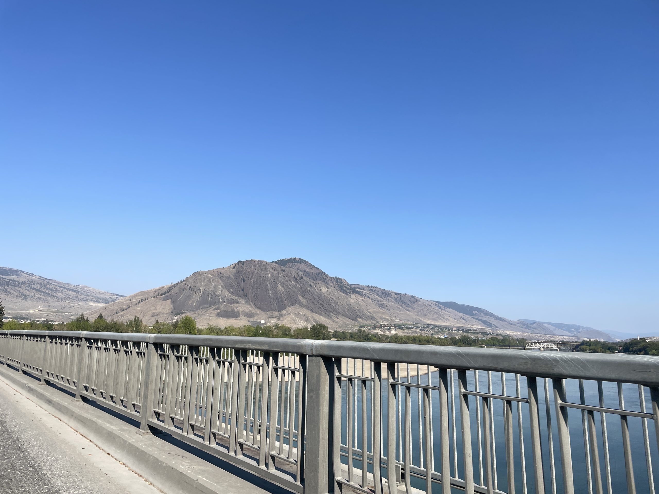 Showcasing part of the bridge and Kamloops mountain