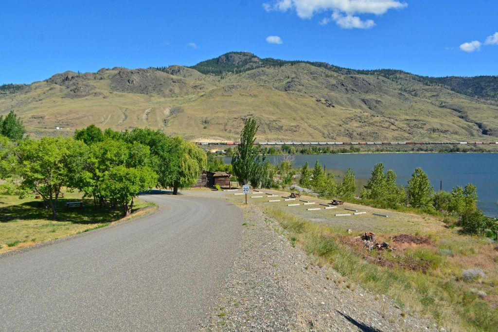 Photo of Steelhead (Sk'emqin) Provincial Park at the background the train is passing by. Camping sites near Kamloops